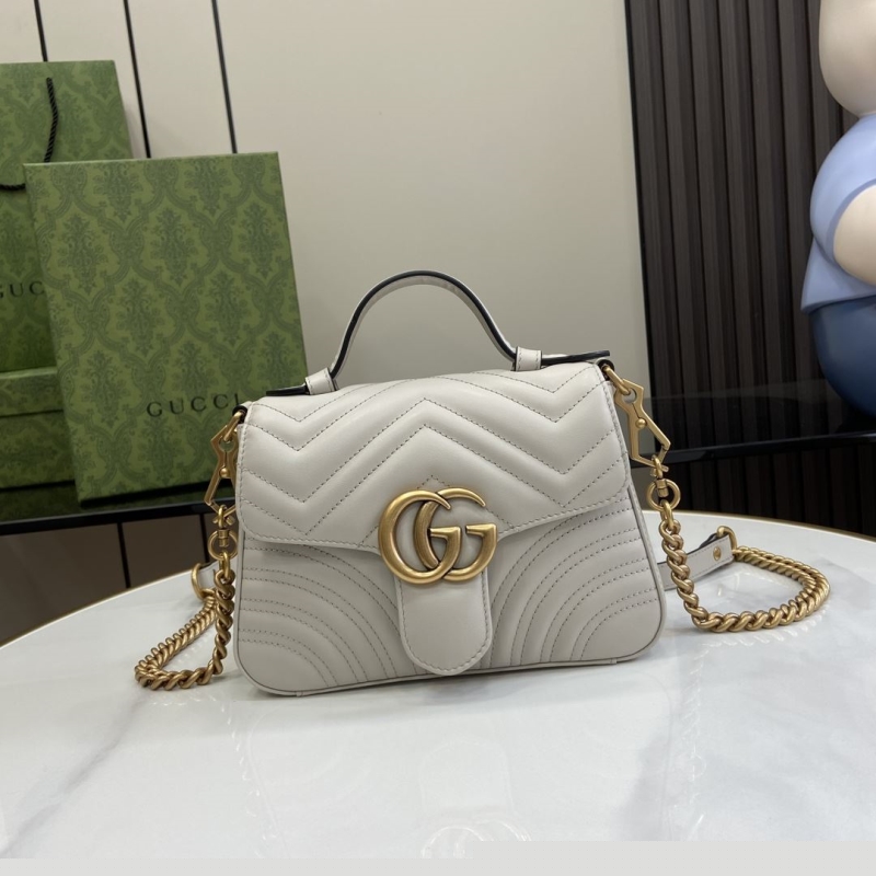 G*u*i top handle bags